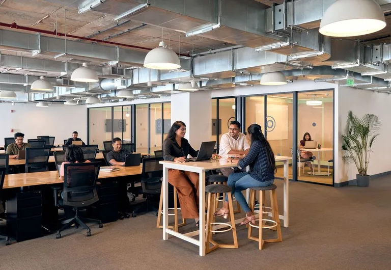Team working in a WeWork private office